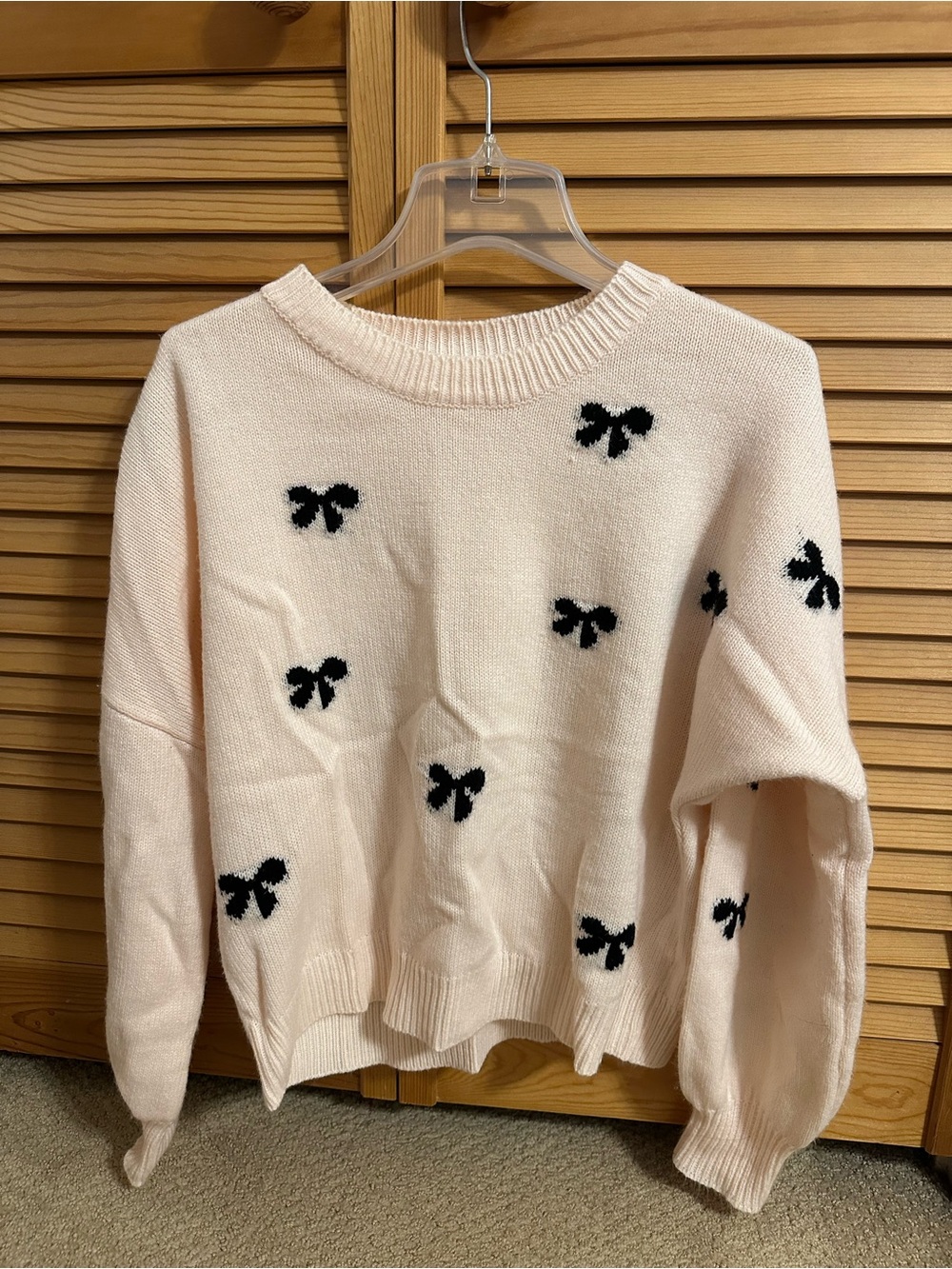 Women's Cream Bow Pattern Crewneck Sweater